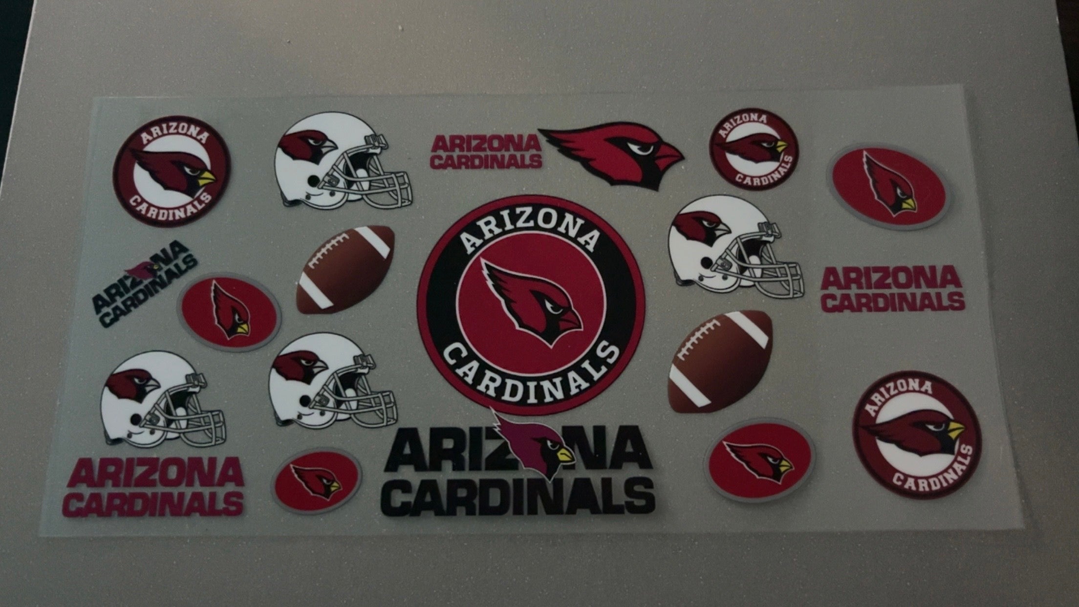 Arizona Cardinals with helmets & footballs