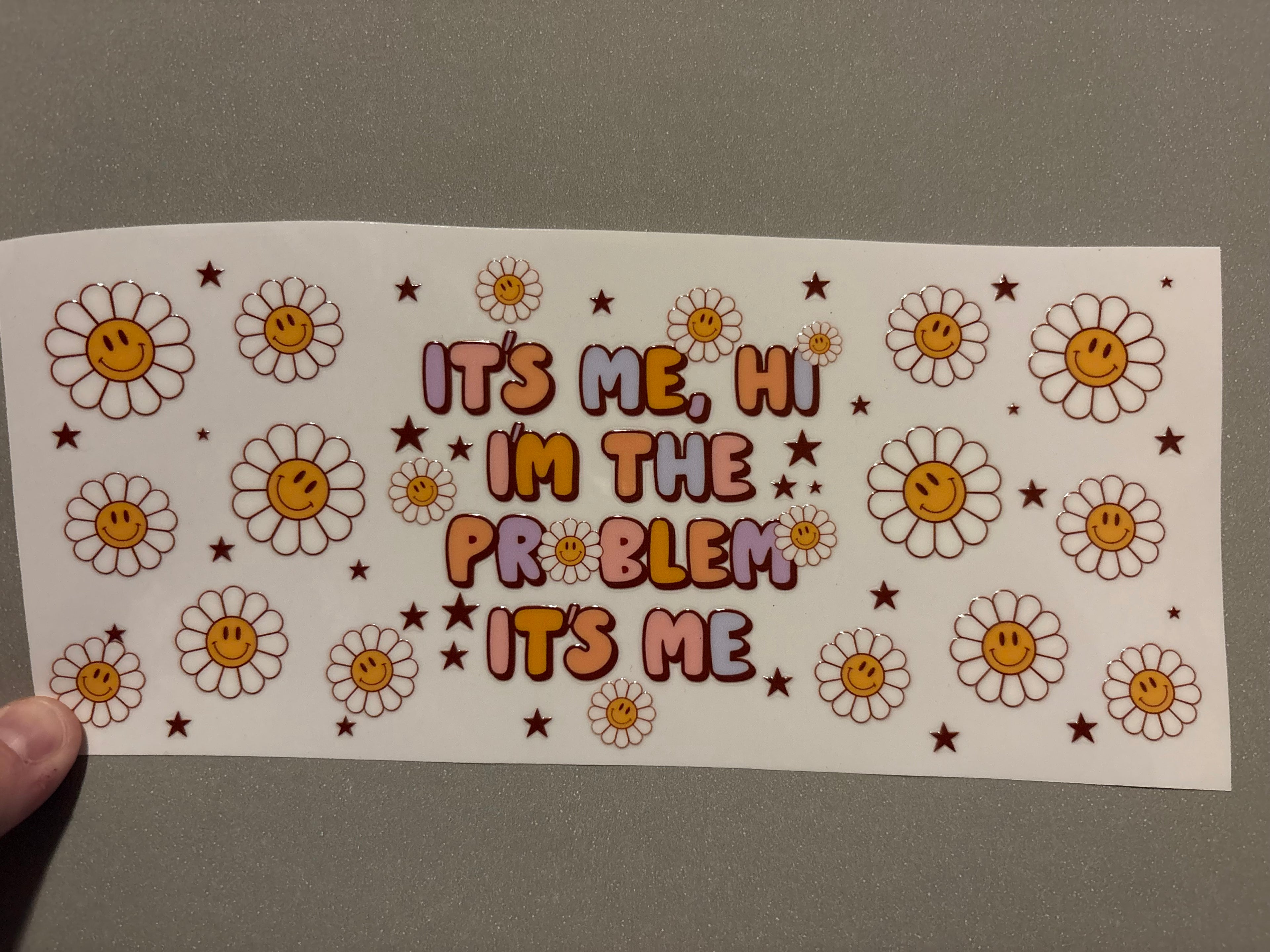 It's me, hi, I'm the problem it's me, smiley face daisies, stars