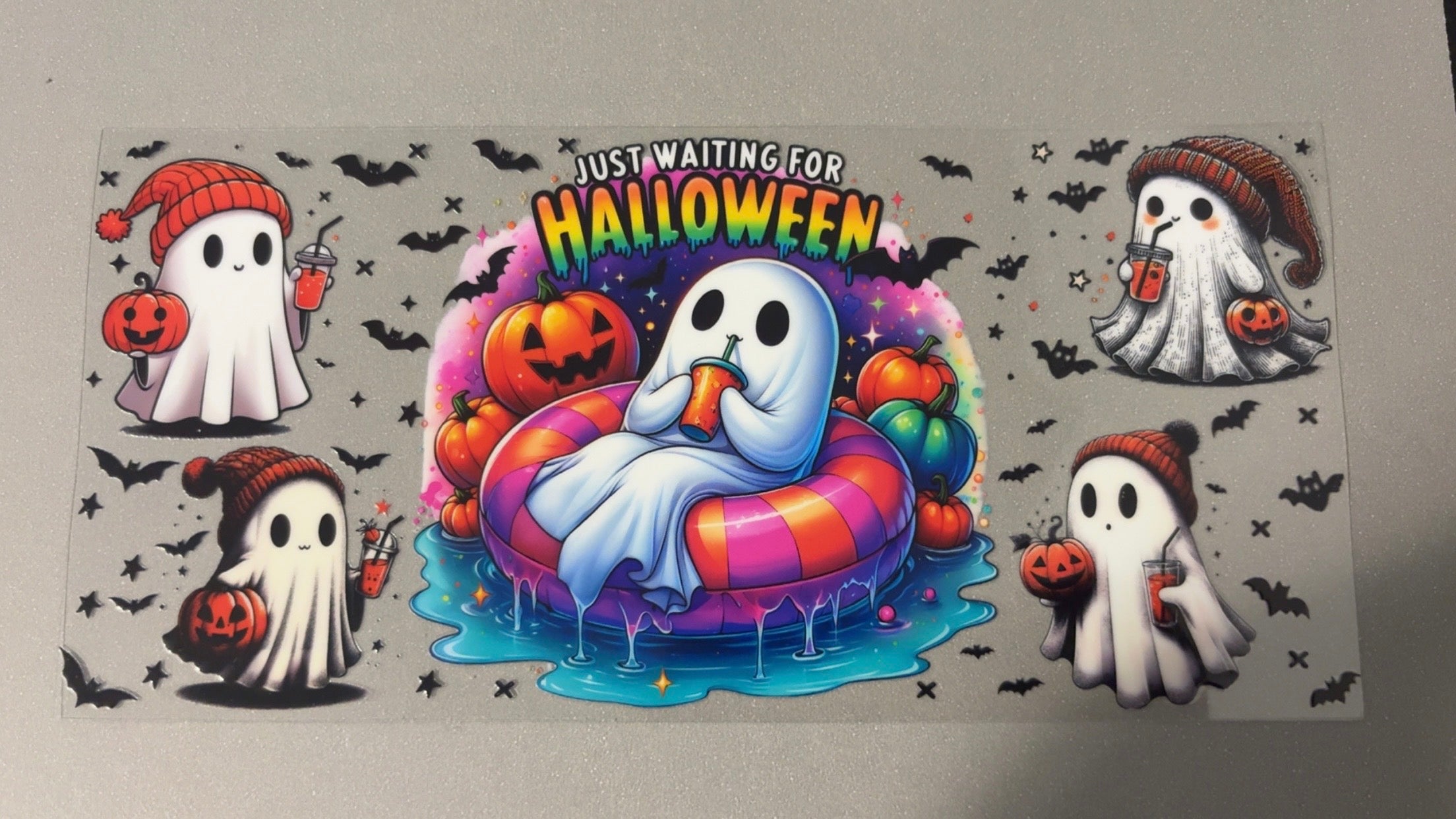 Waiting for Halloween with ghost on tube & bats