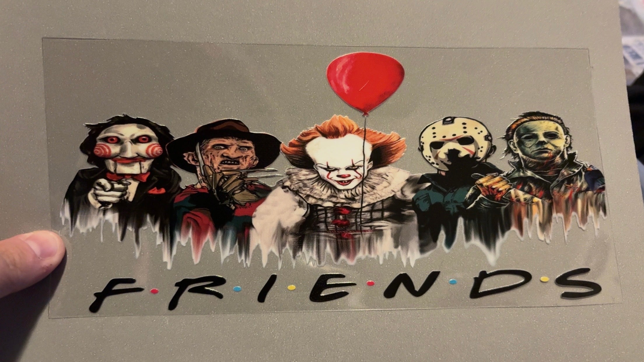 Scary friends with black writing