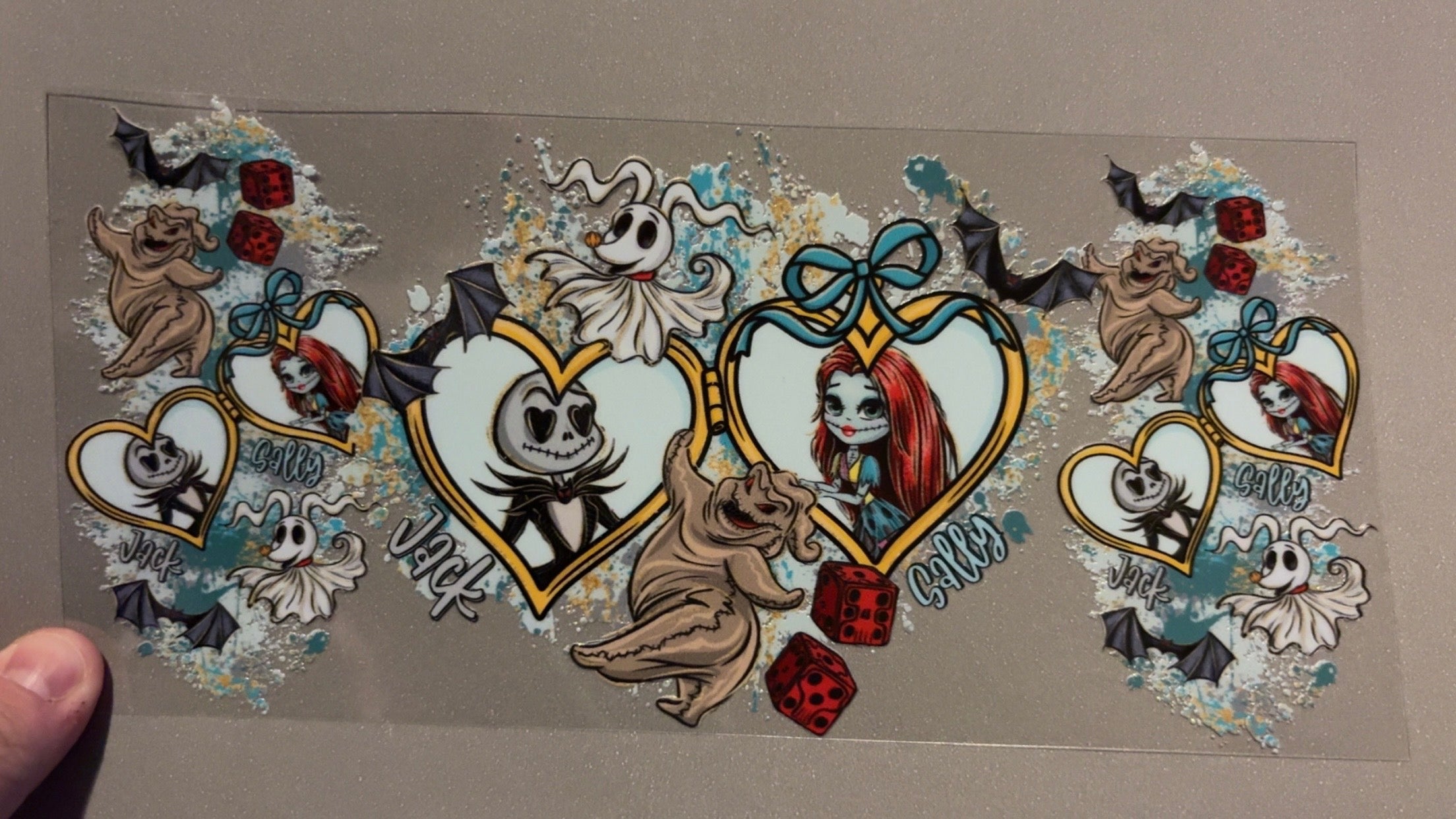 Jack & Sally in gold hearts, red dice