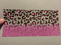 Pink cheetah print, pink glitter across the bottom