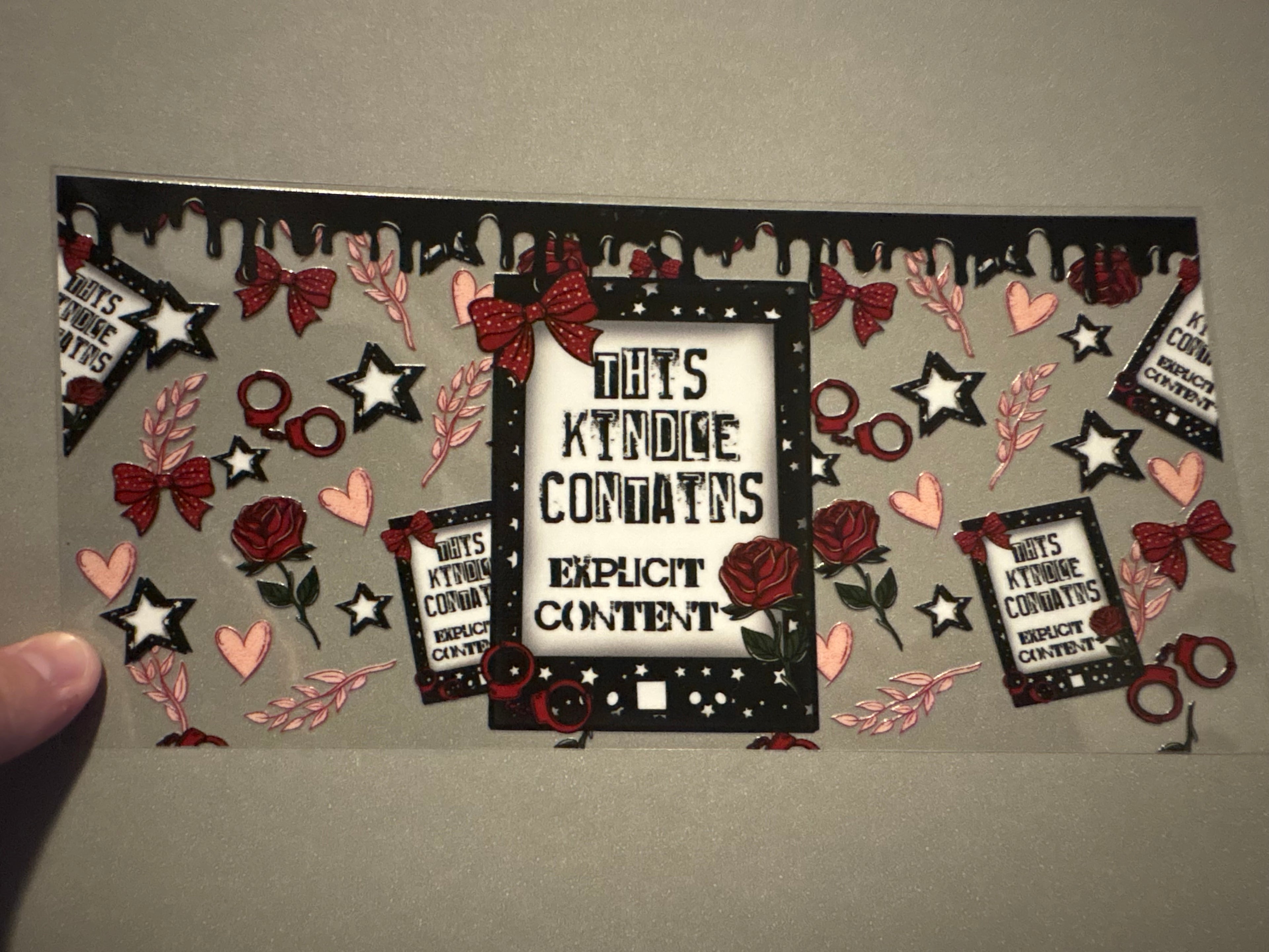 This kindle contains explicit content, handcuffs, roses, hearts & stars