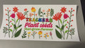Teachers plant seeds, flowers