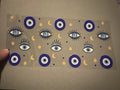 Evil eye, eyeballs, stars, moons, blue dots