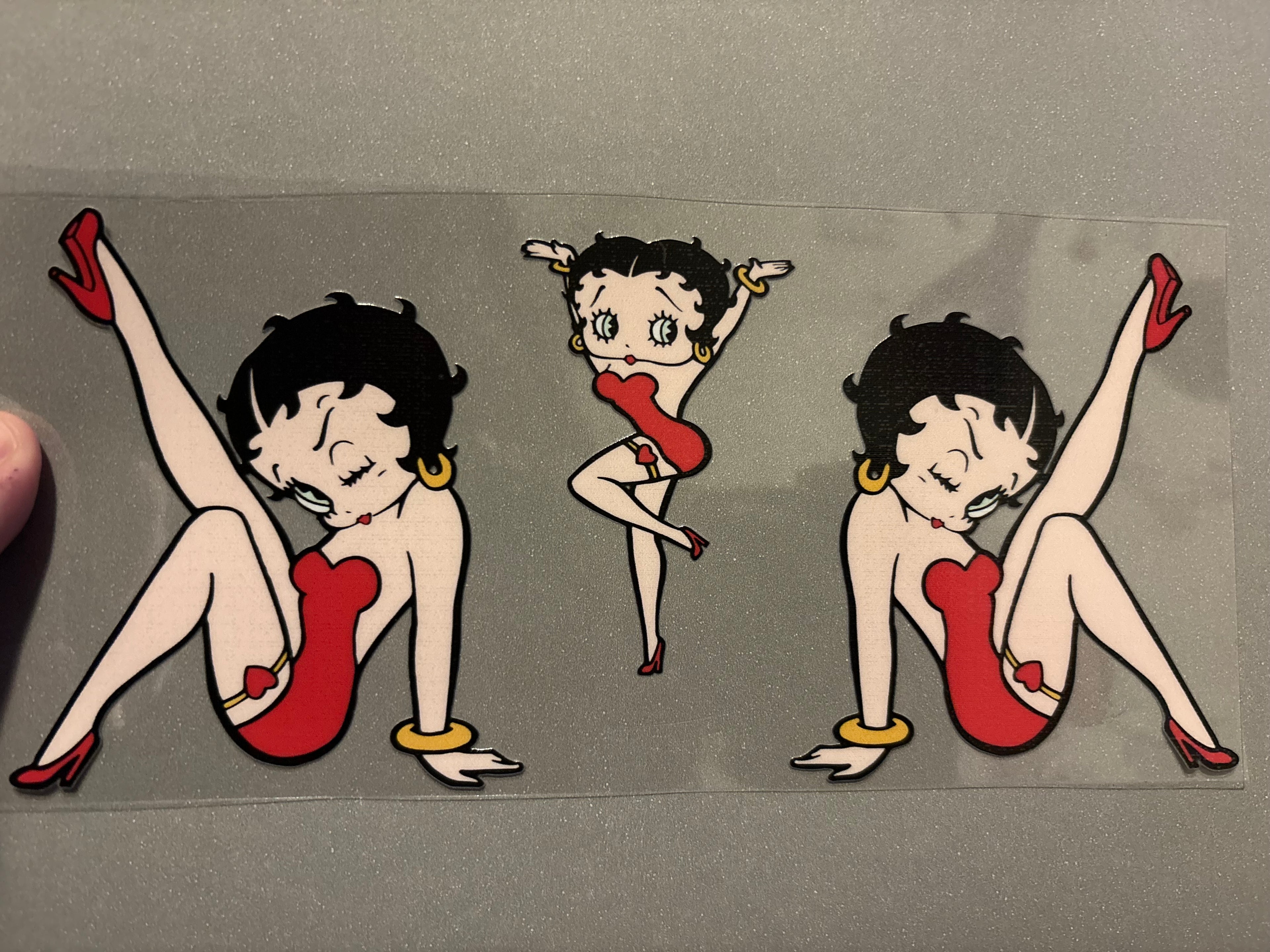 Betty Boop with legs kicked up