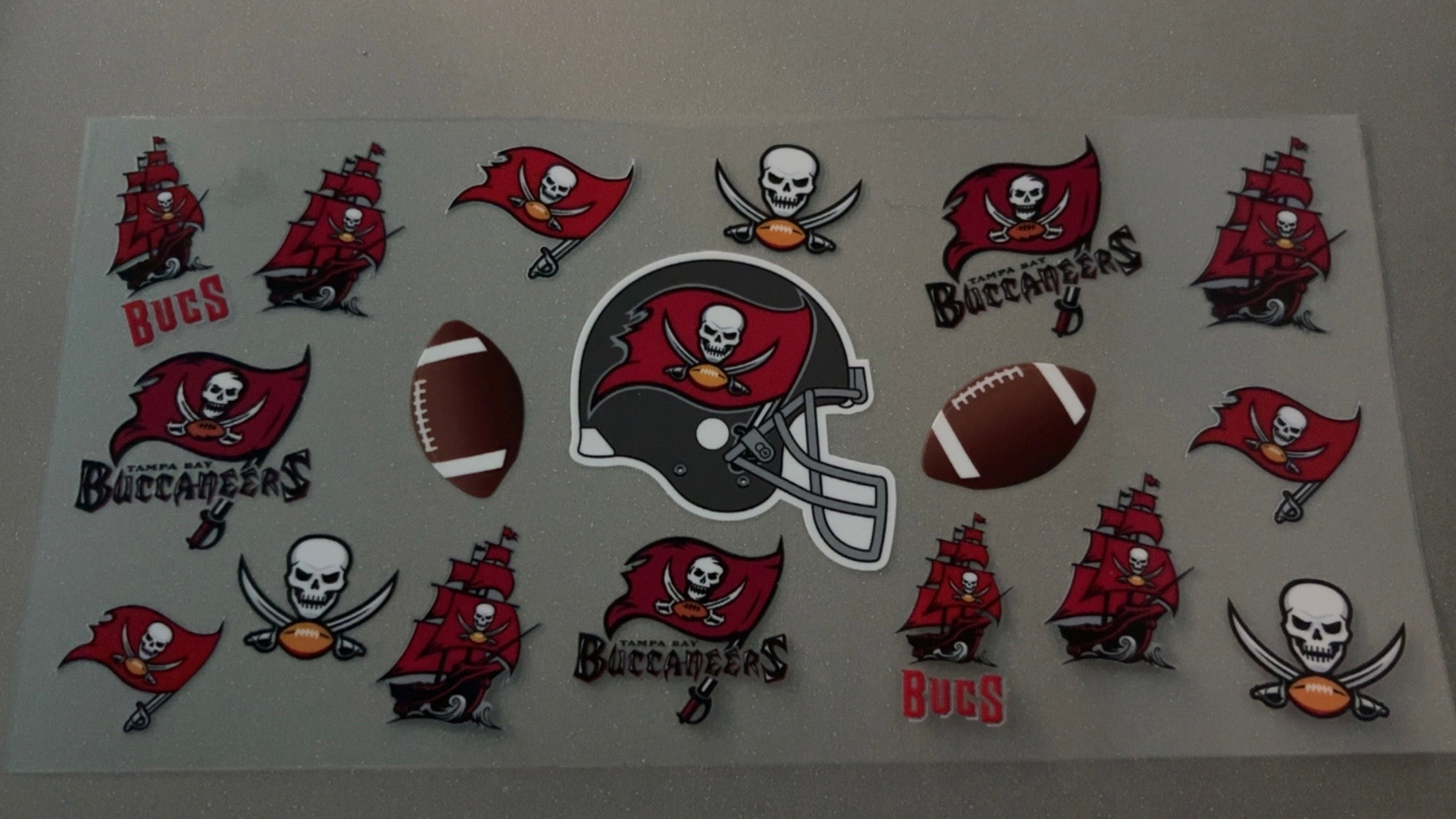 Tampa Bay Buccaneers with helmet & flags