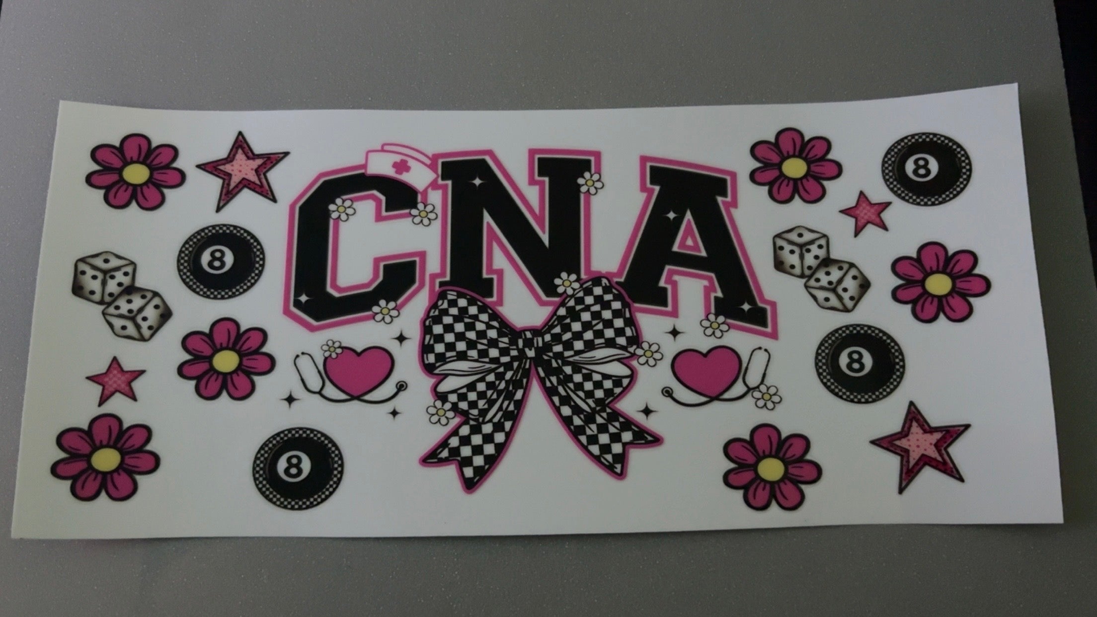 CNA, black checkered bow, flowers, 8 balls
