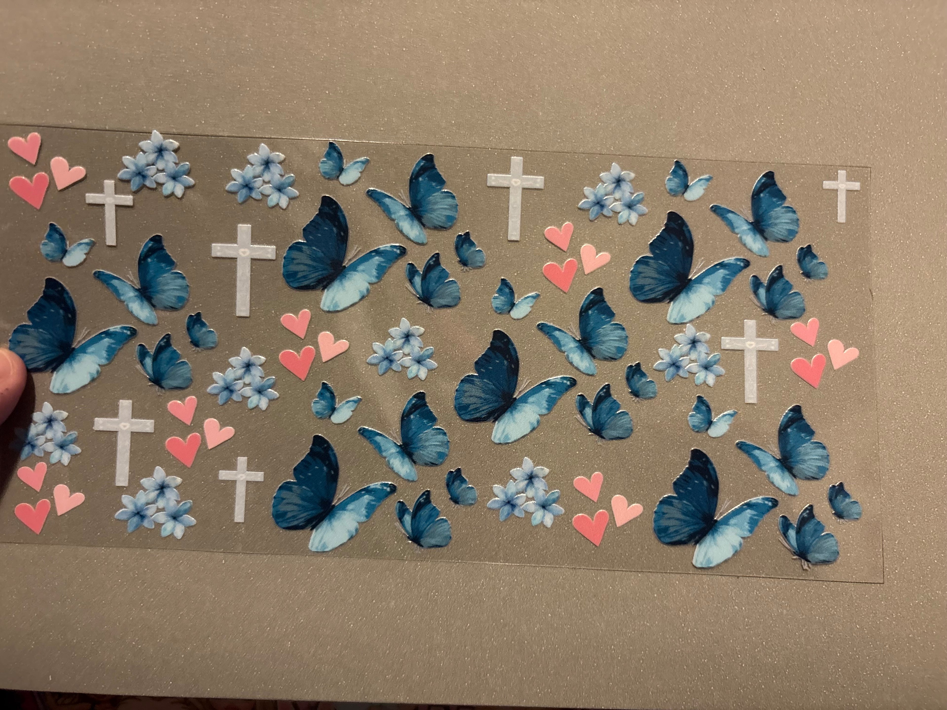 Blue butterflies, blue flowers, pink hearts, crosses