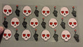 Heart eyes skull head, skeleton hands snapping
