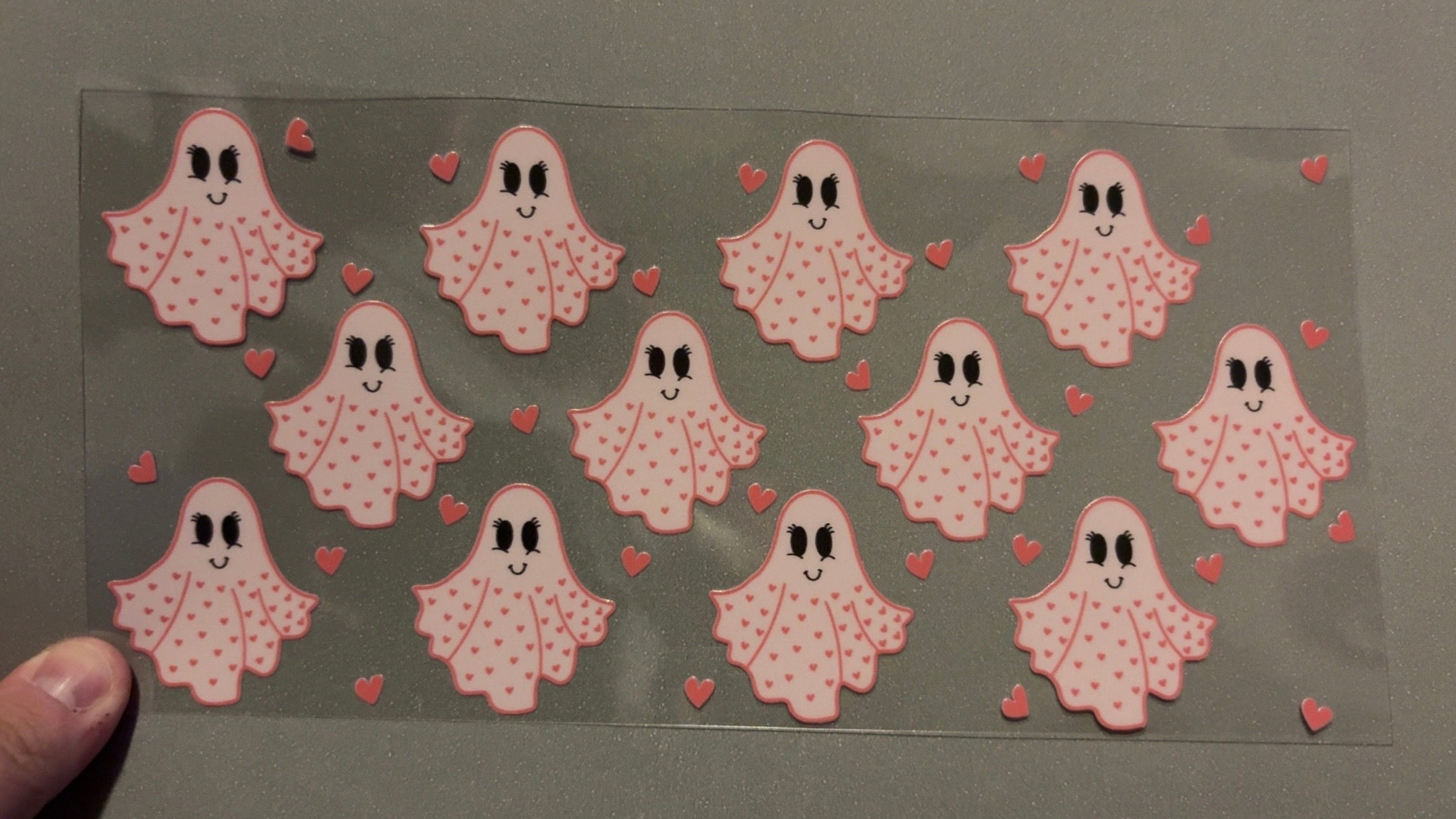 Pink ghosts with hearts