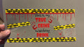 True crime watching drink, caution tape, blood drip