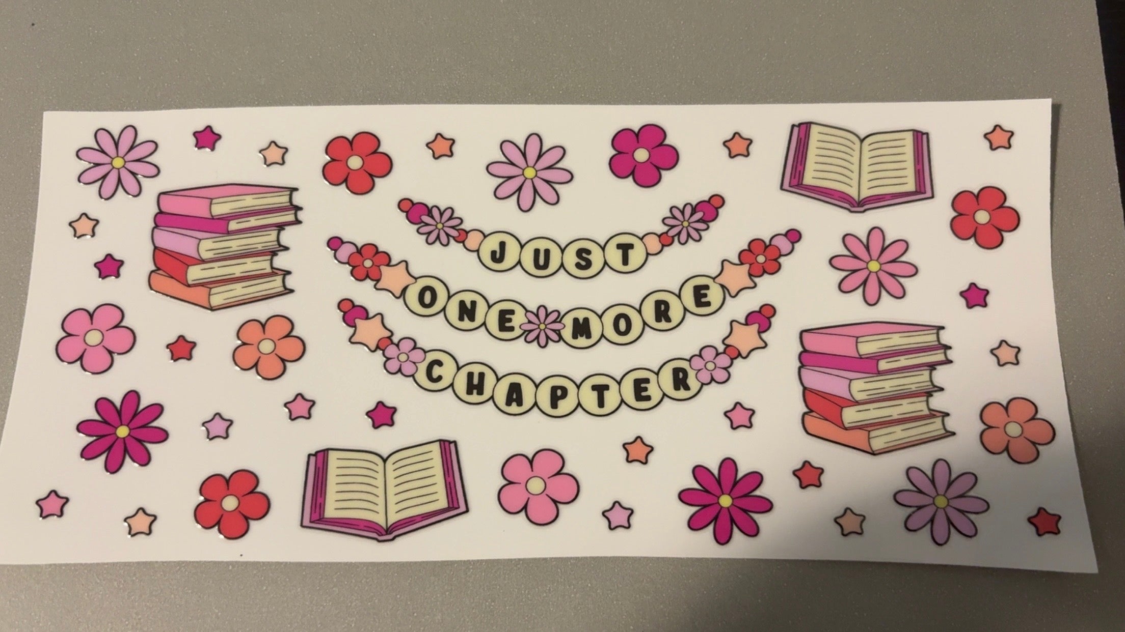 Just one more chapter beads, books, flowers, stars