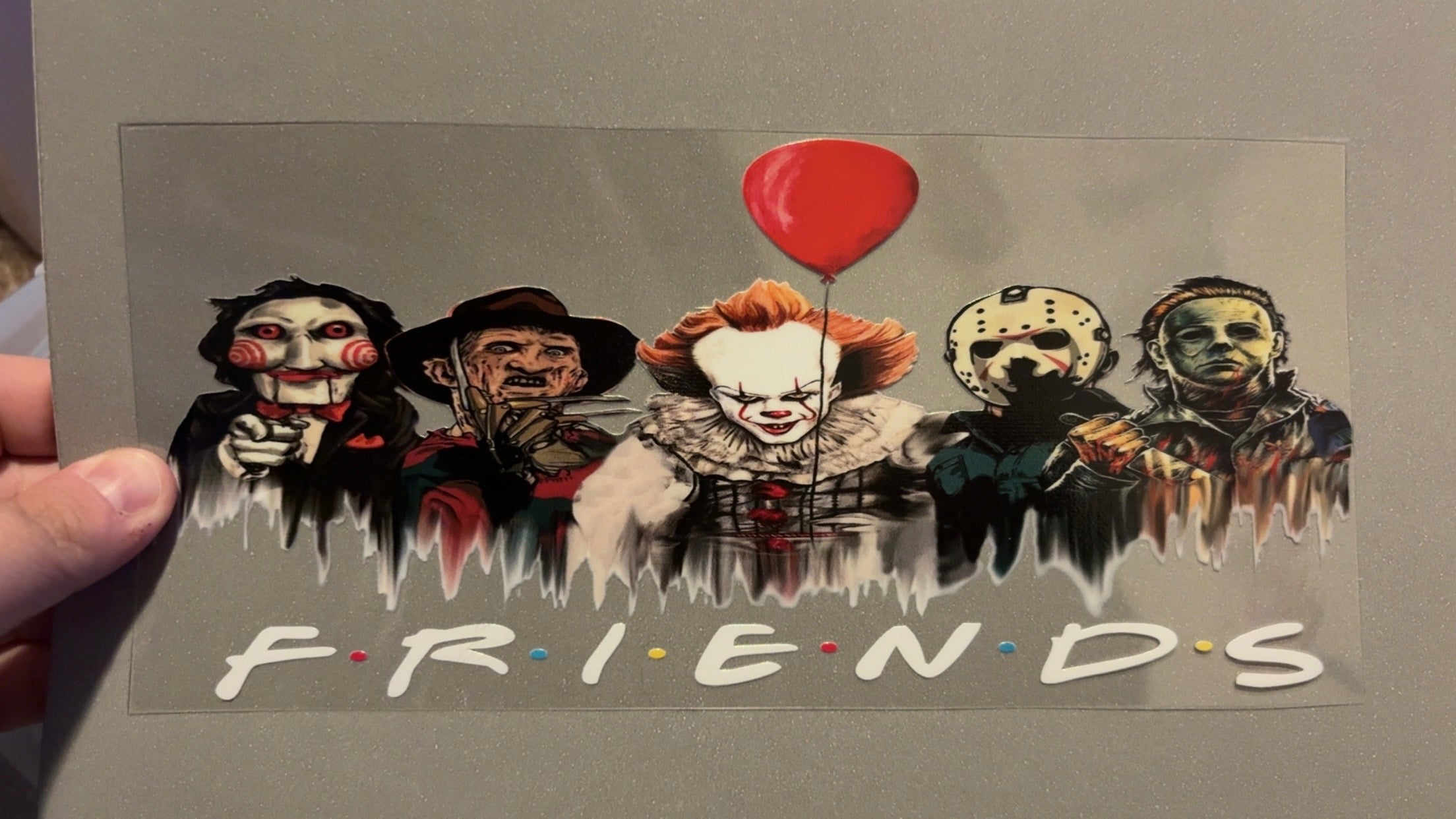 Scary friends with white writing