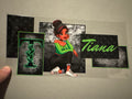 Tiana, green top, black pants, white shoes
