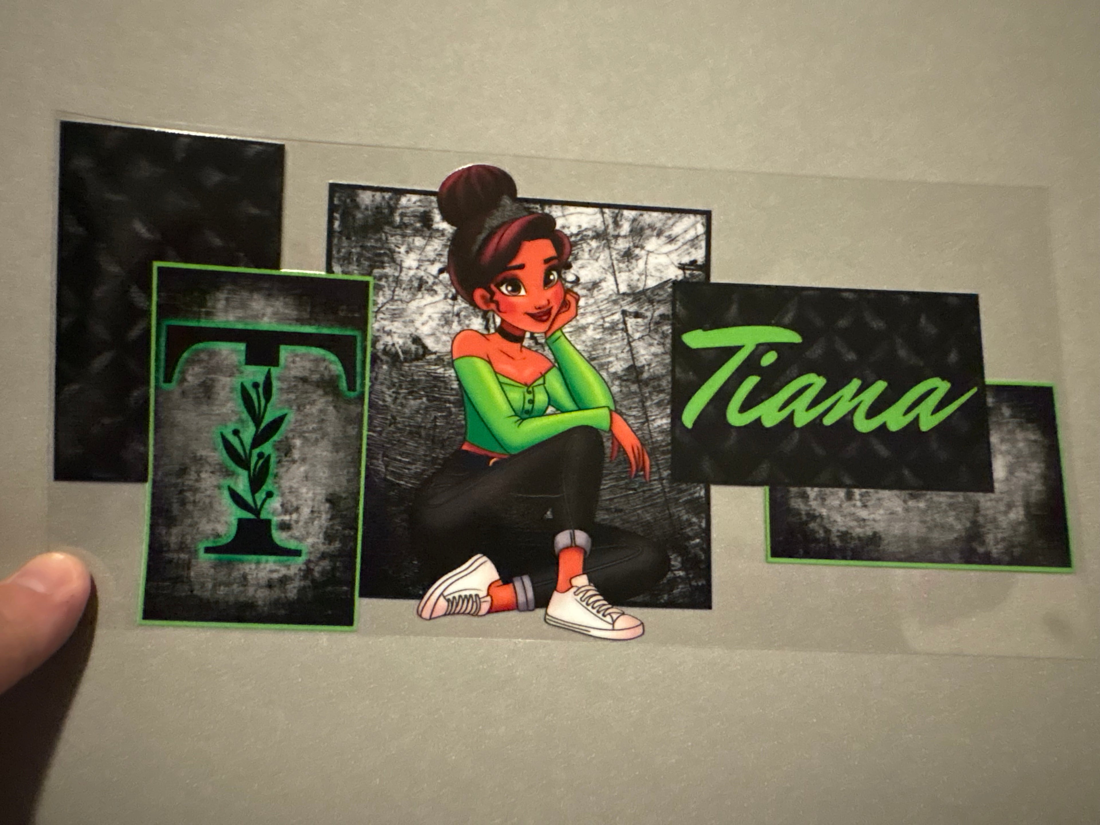 Tiana, green top, black pants, white shoes