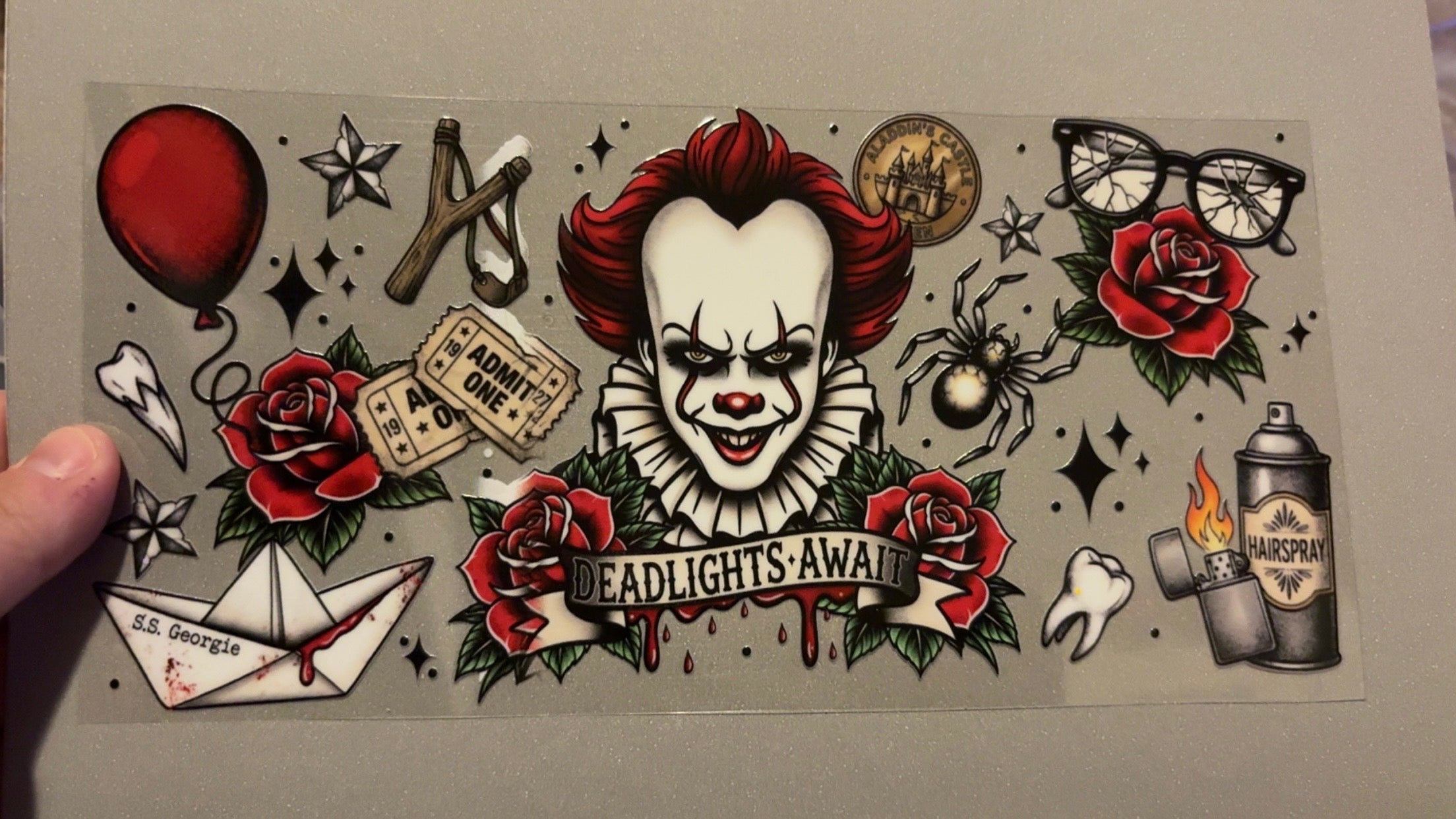 Deadlights await, IT, red balloon, slingshot, spider, hairspray, lighter