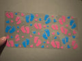 Pink & blue baby feet, pink & blue hearts