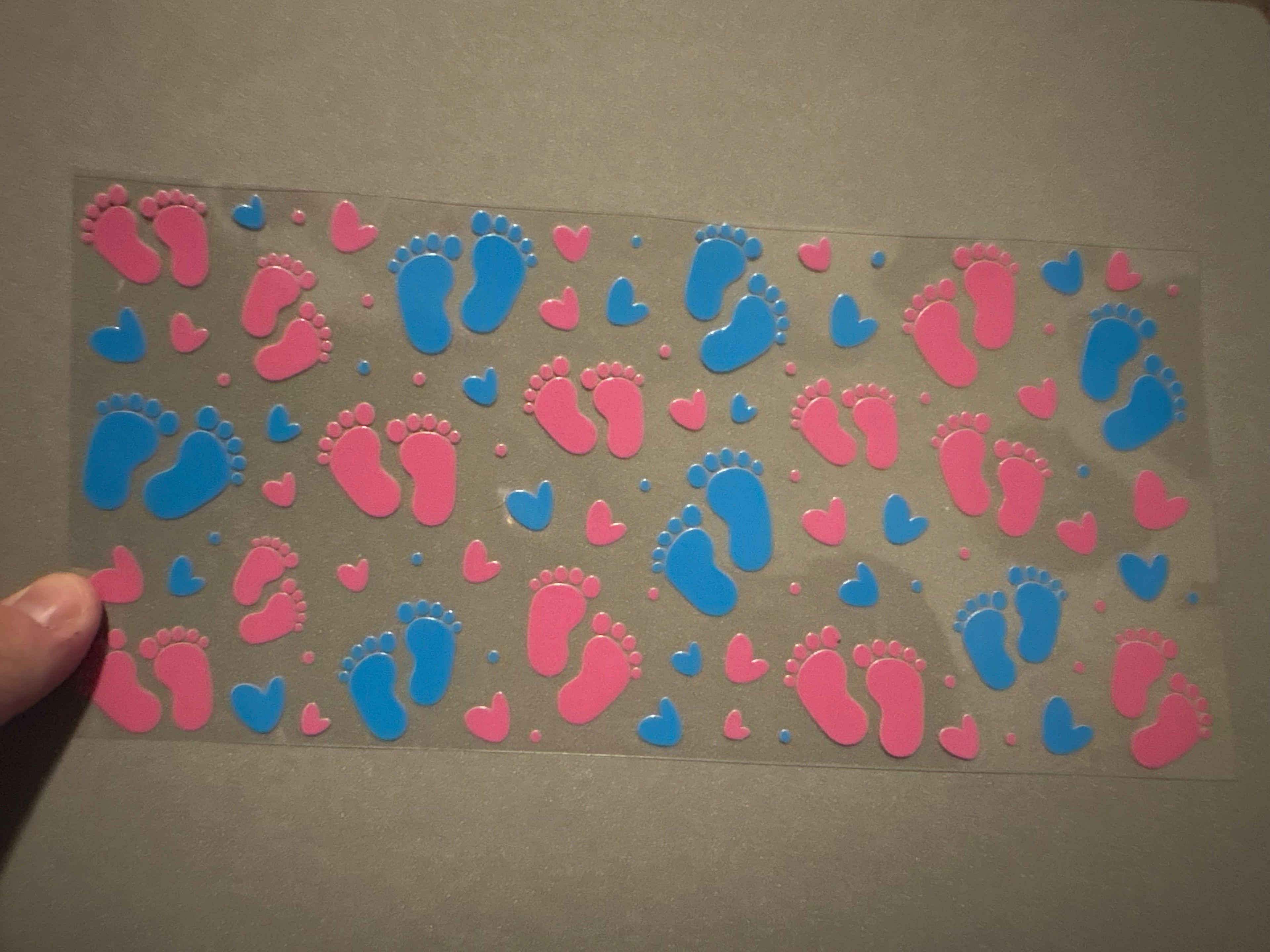 Pink & blue baby feet, pink & blue hearts