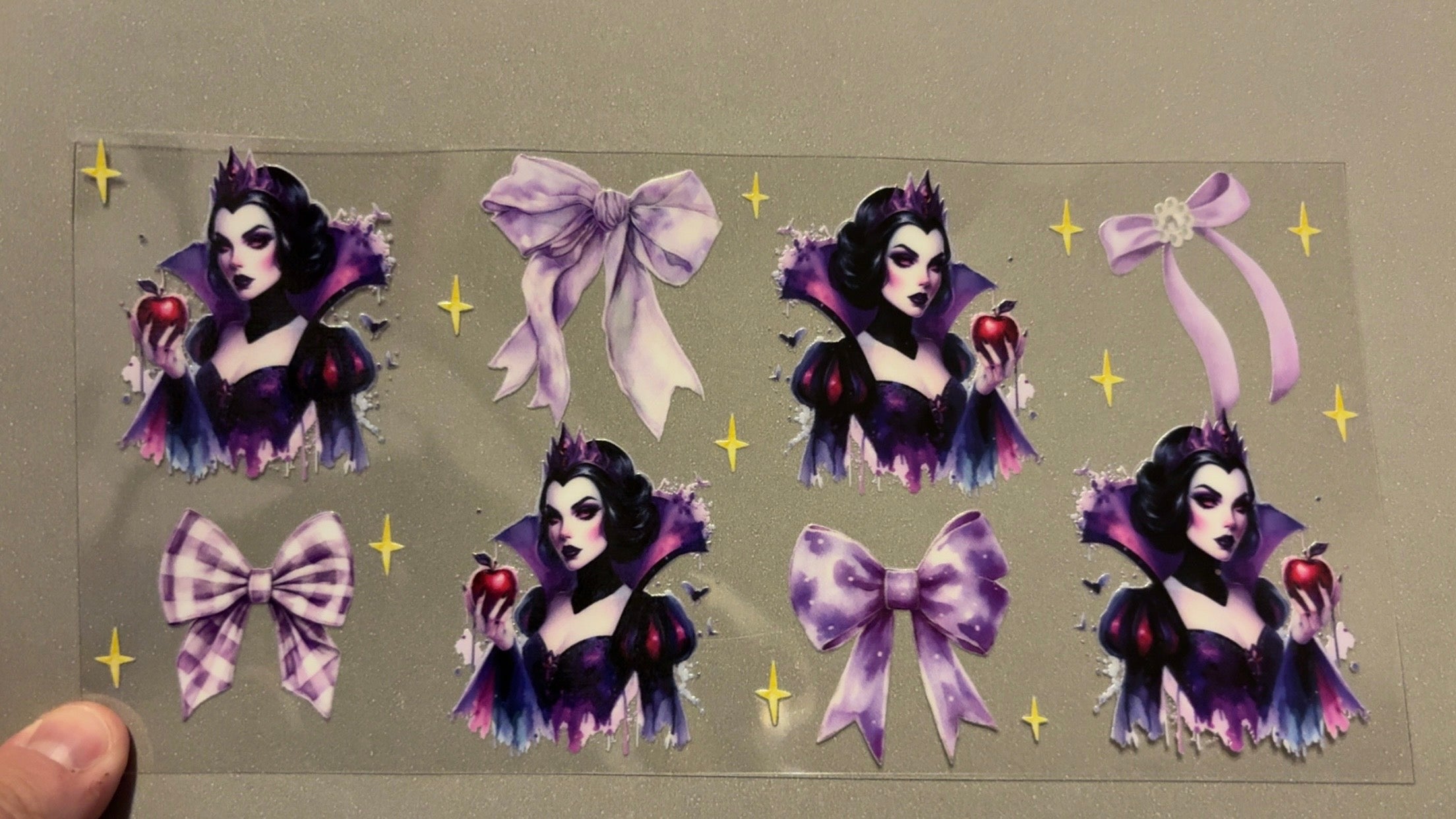 Dark princess with apple, pruple bows, yellow sparkles