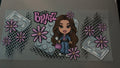 Brunette Bratz doll with lego's, pink flowers