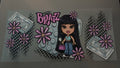 Long black hair Bratz with pink flowers, lego's