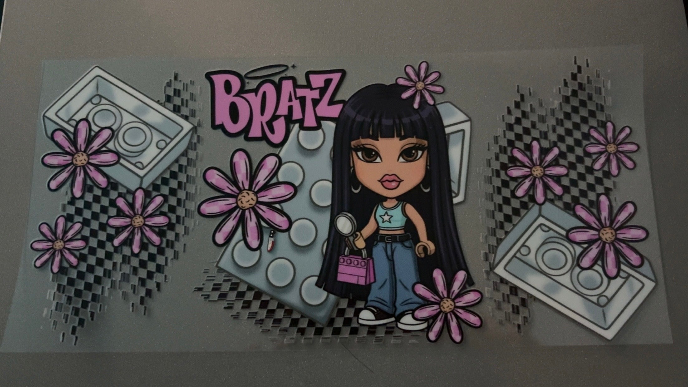 Long black hair Bratz with pink flowers, lego's