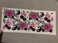 Pink roses, black dice, ying yang symbols, pink flames