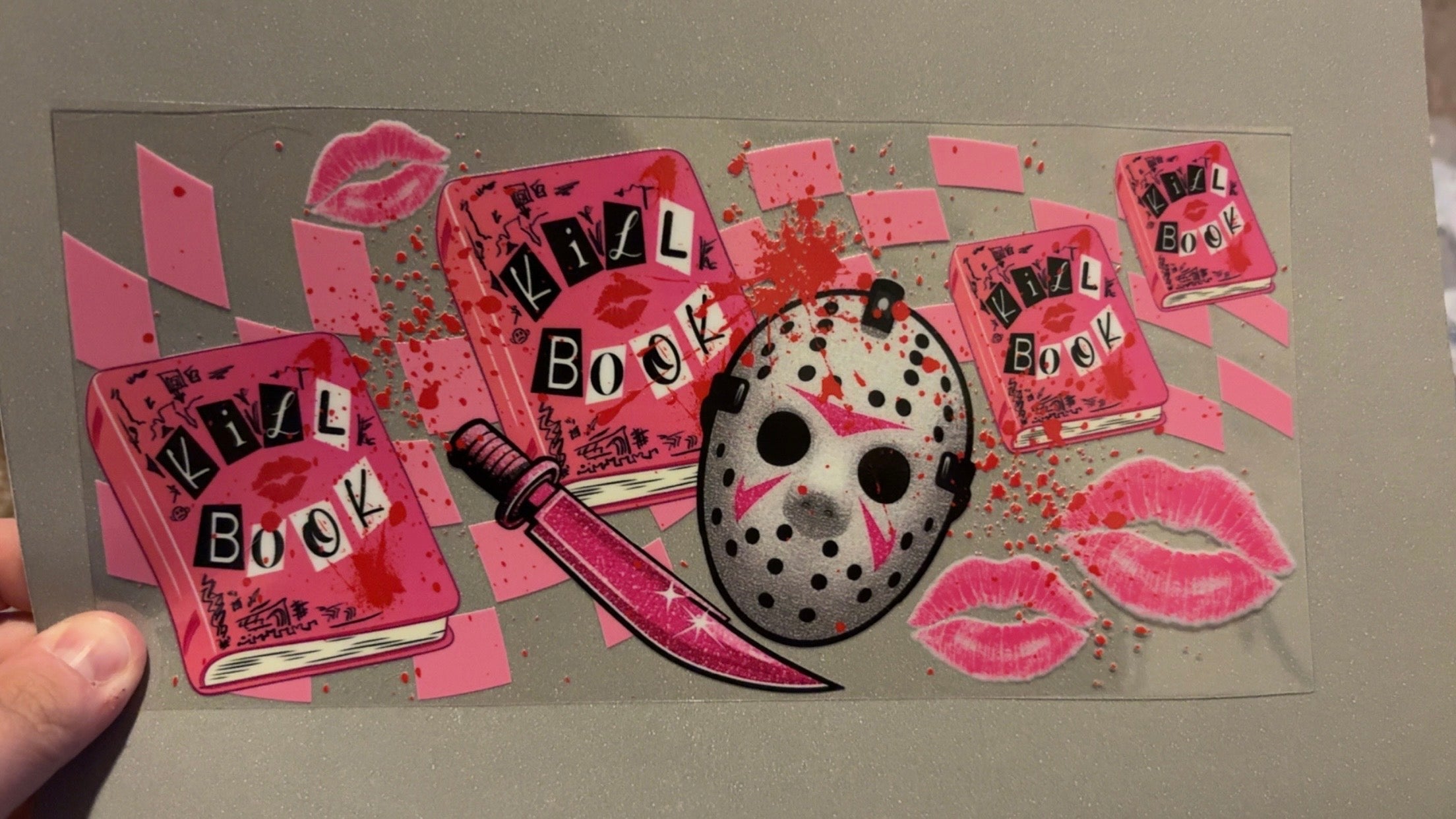 Pink kill book, michael myers mask, knife, kiss lips