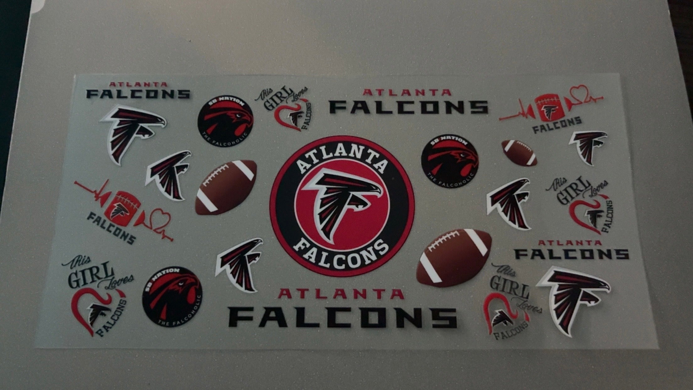 Atlanta Falcons with footballs & logo's