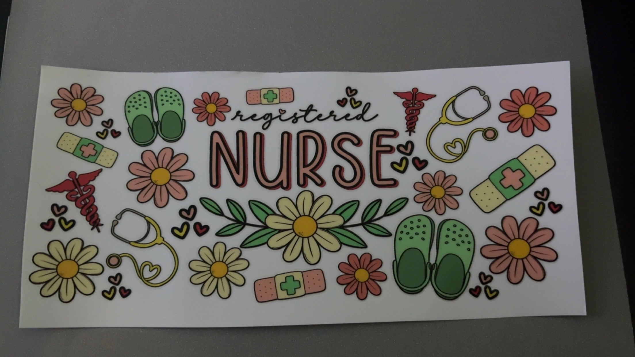 Registered Nurse, crocs, flowers, bandaids