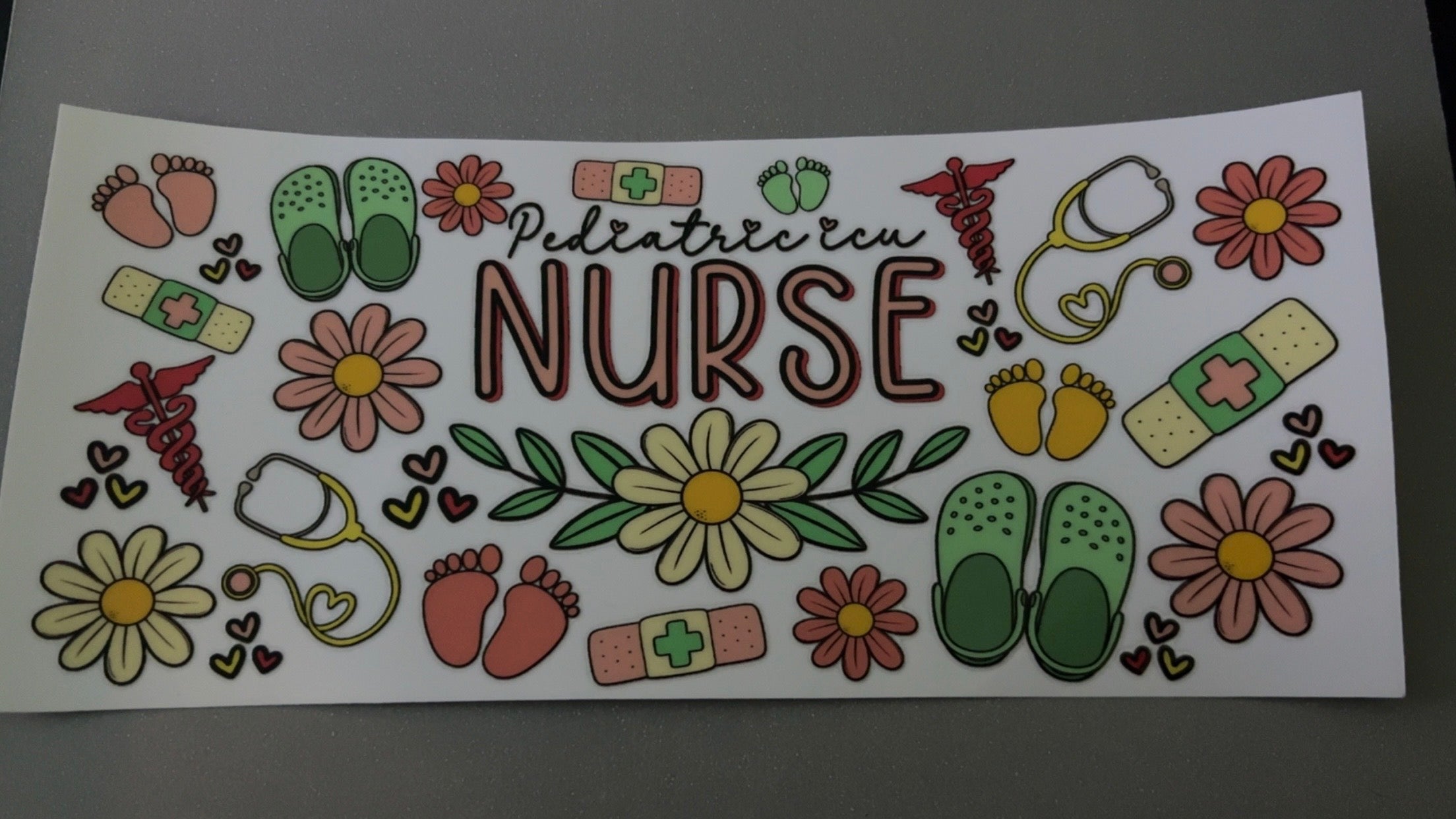 Pediatric ICU Nurse, crocs, flowers, bandaids