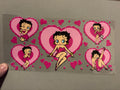 Betty Boop inside of pink hearts