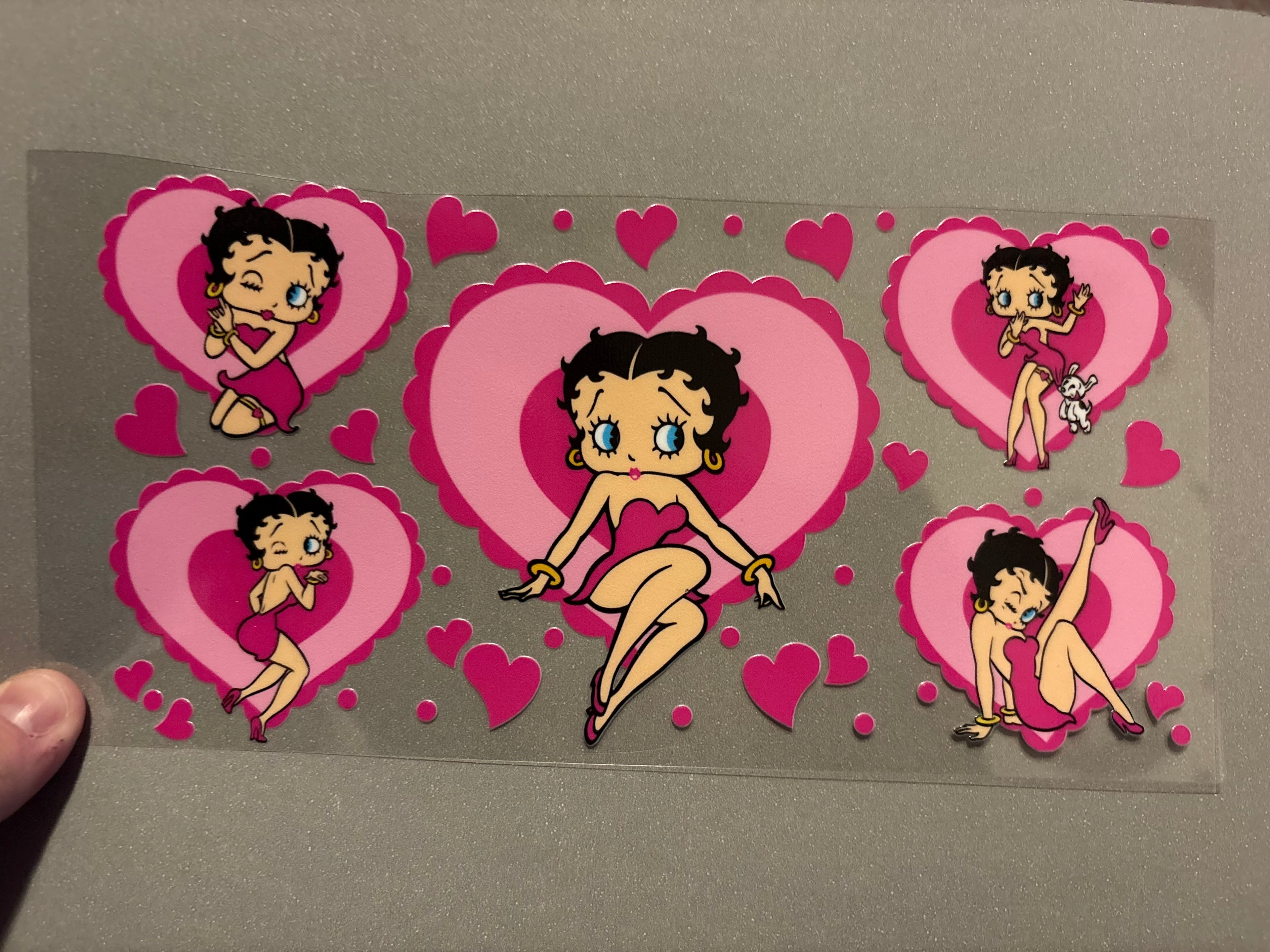 Betty Boop inside of pink hearts