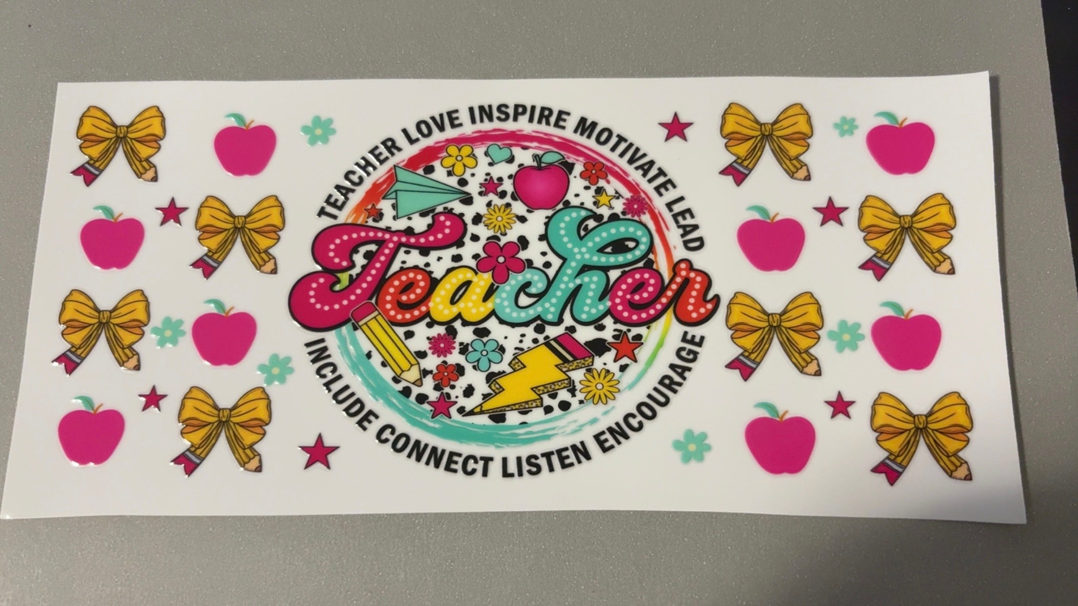 Teacher, pencil bows, apples, stars