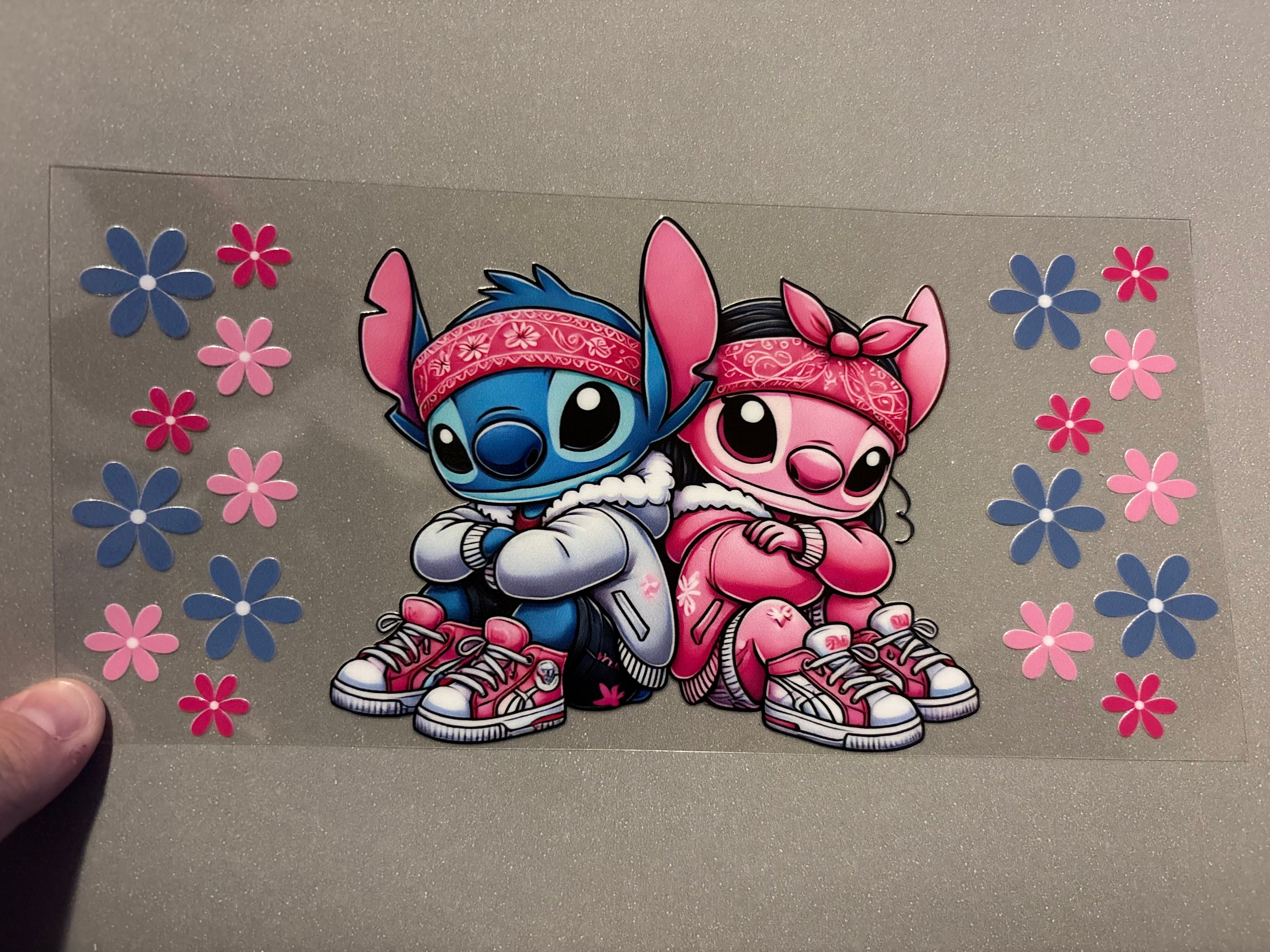 Stitch & Angel with headbands, blue & pink flowers