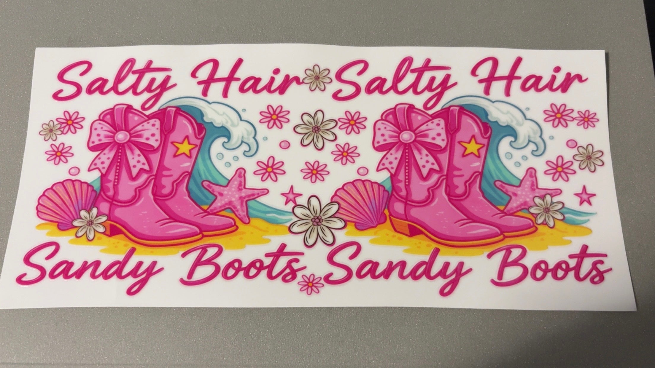 Salty hair, salty boots, cowgirl boots, waves, flowers