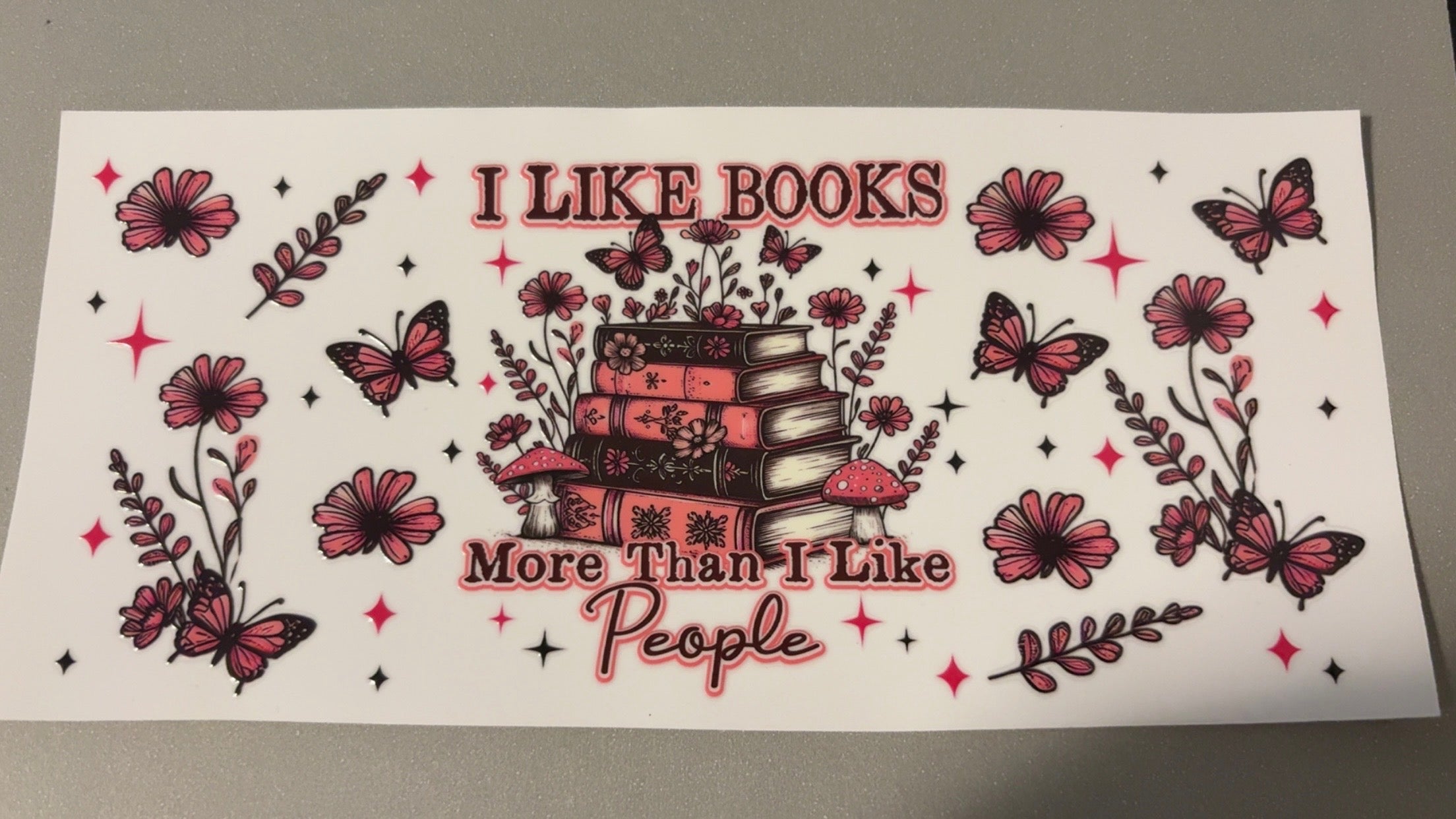 I like books more than I like people, pink books, pink butterflies