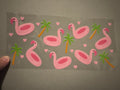 Flamingo floats, palm trees, pink hearts