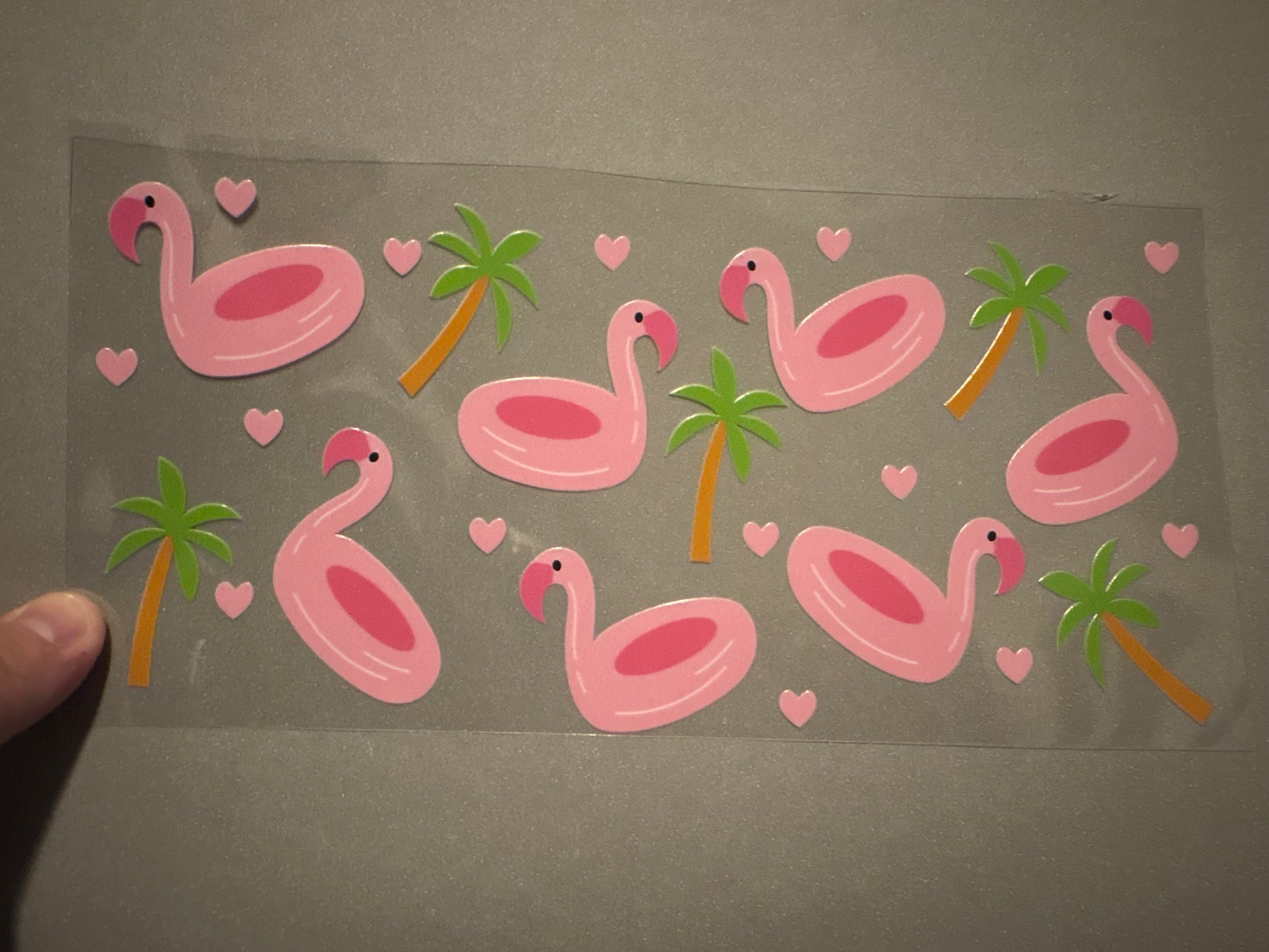 Flamingo floats, palm trees, pink hearts