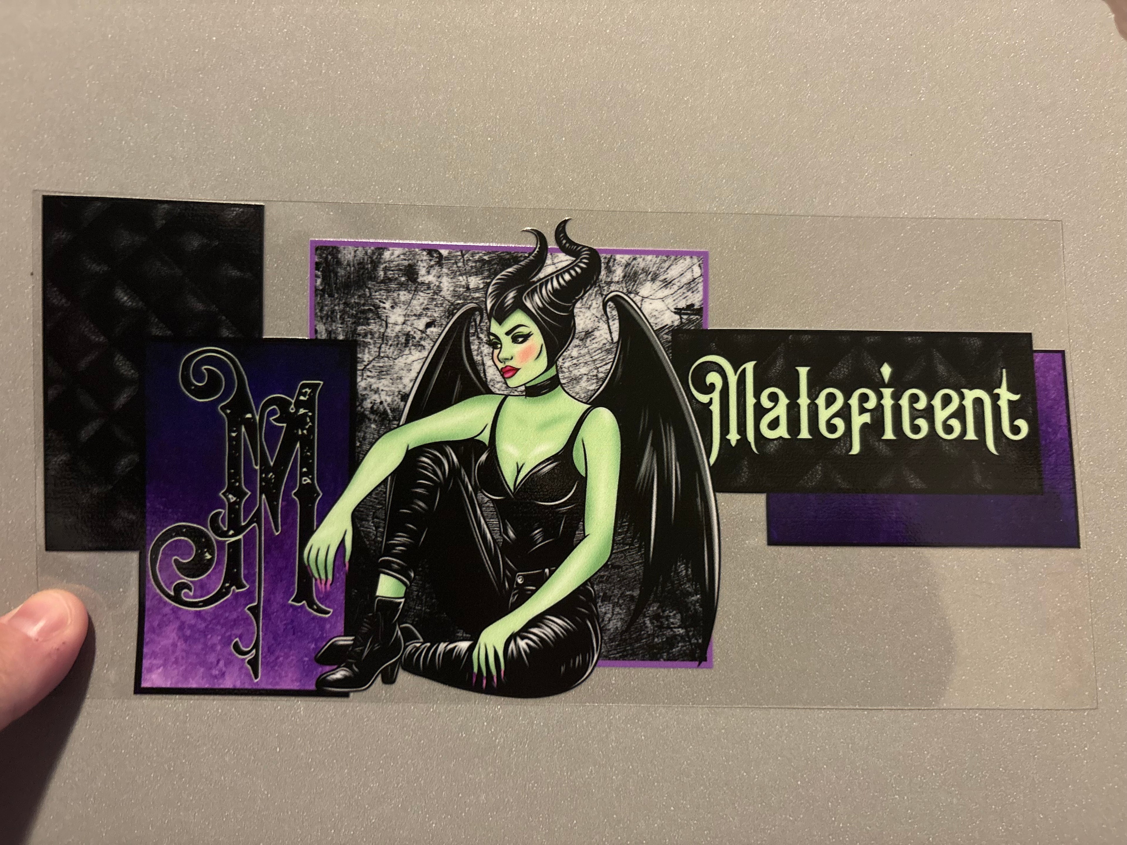 Green Maleficent, black suit, black wings