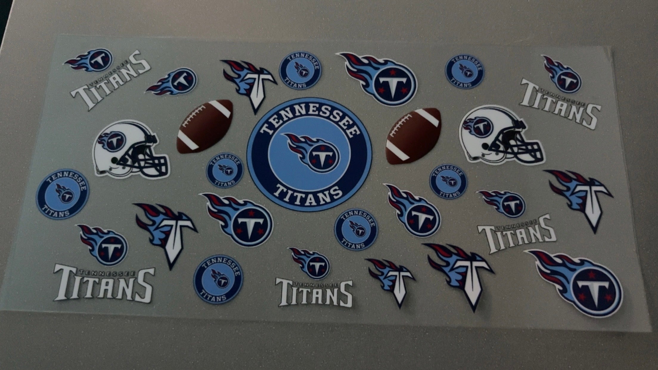 Tennessee Titans with logos, helmets & footballs