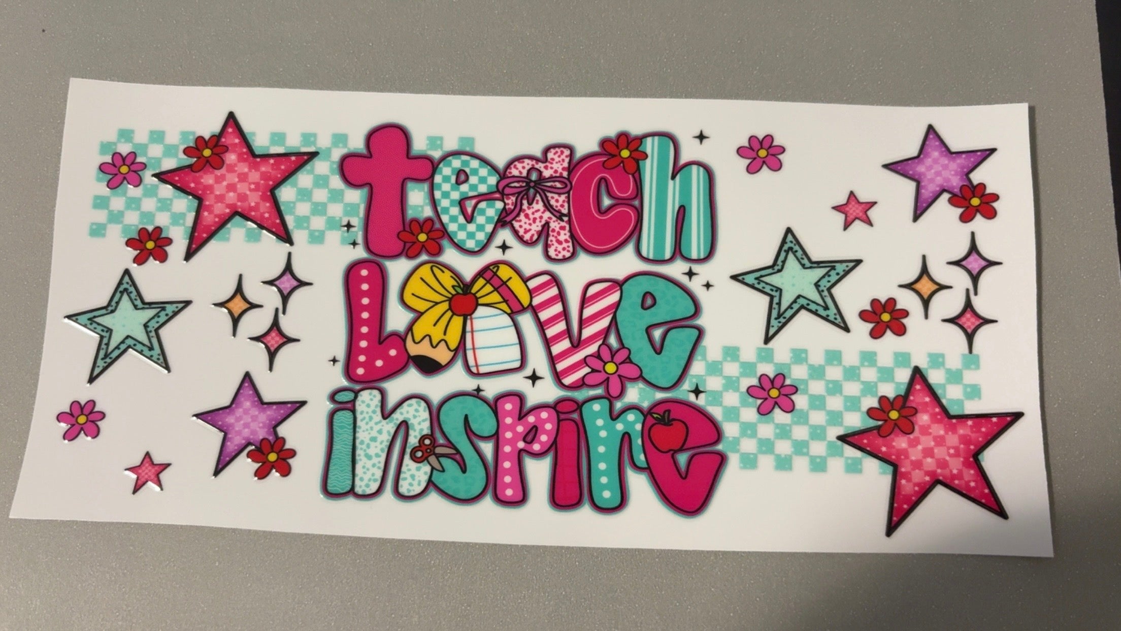 Teach, love, inspire, colored stars