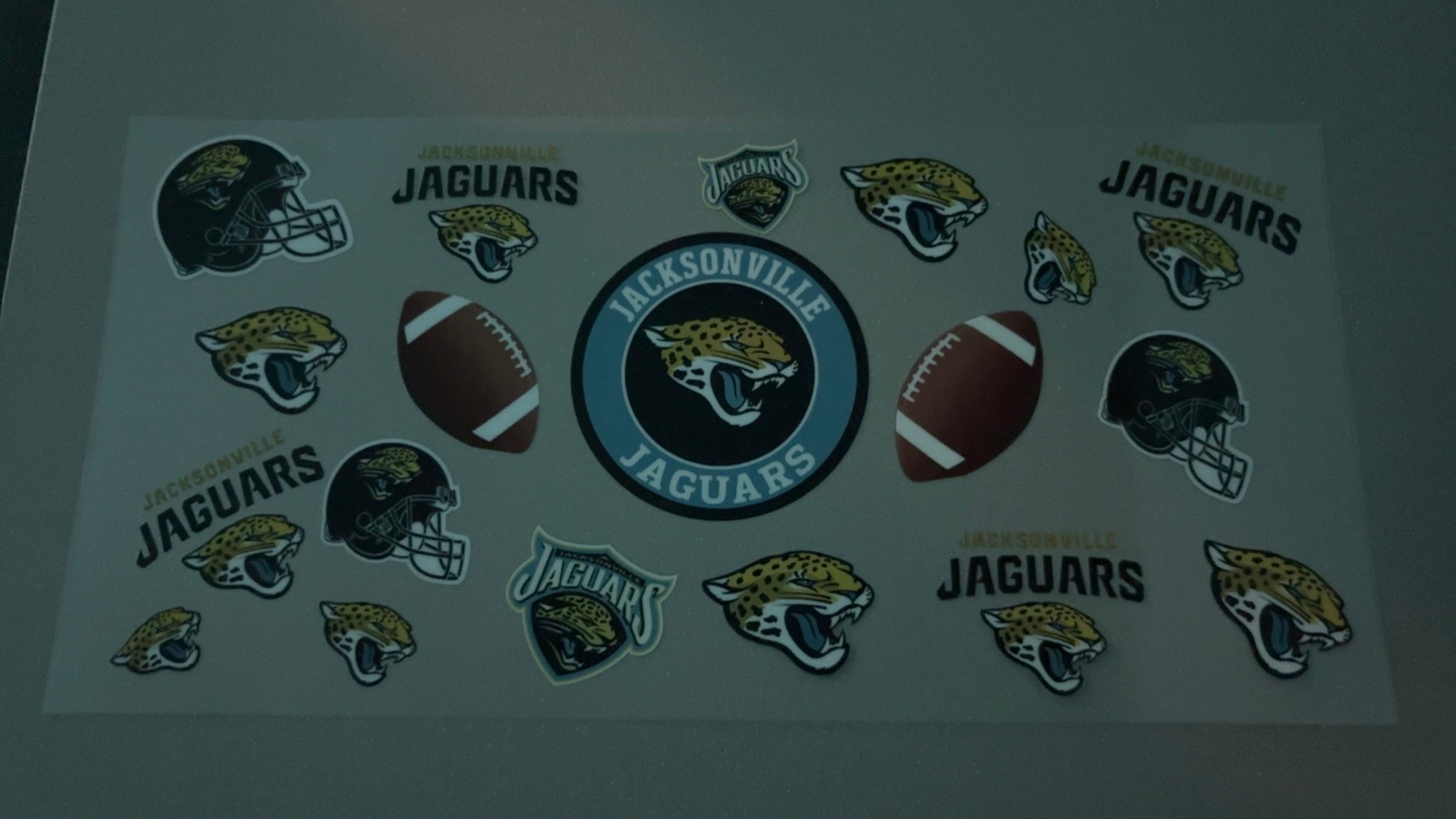 Jacksonville Jaguars with logos, helmets & footballs