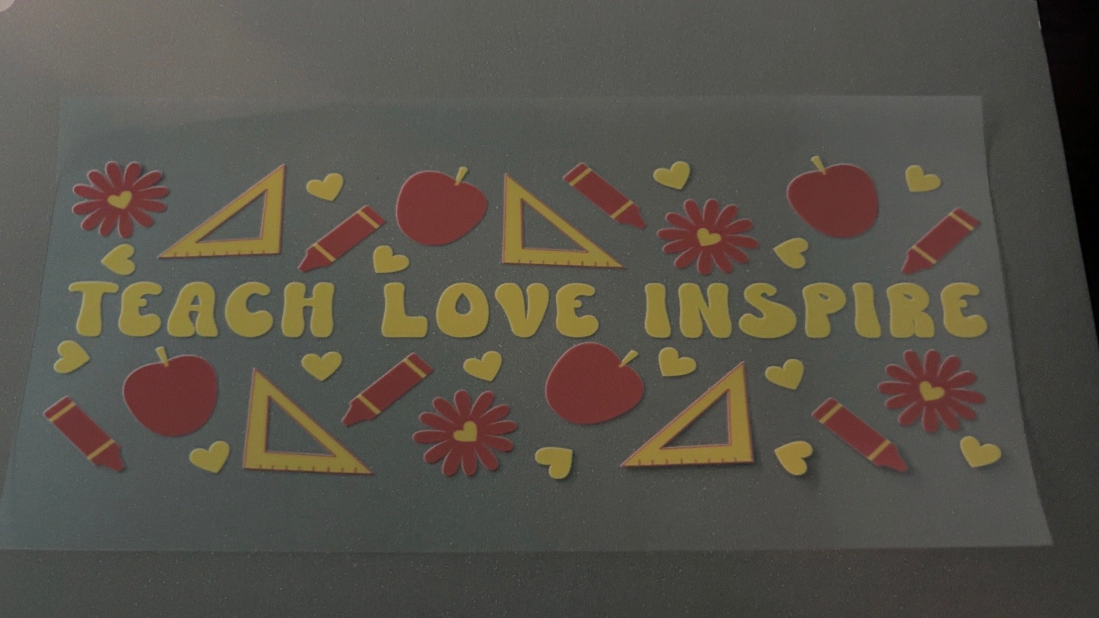 Teach, love, inspire, apples, yellow hearts, yellow triangles